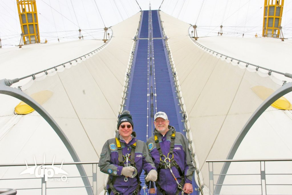 The Bear Patrol team stand under part of the O2 roof, ready to take on the challenge of walking across the roof.