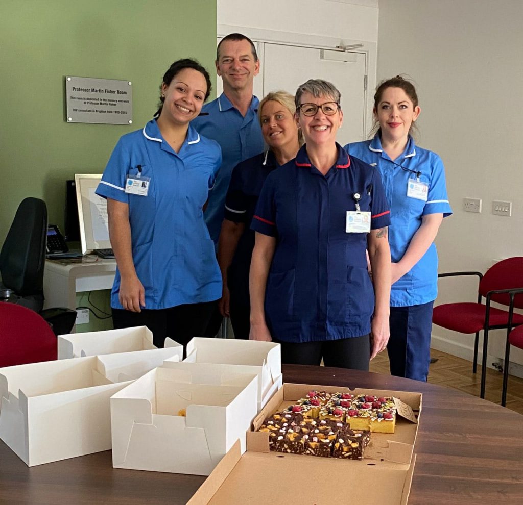 Nurses stand by boxes of food donated by Brighton Businesses